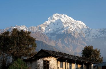 Old School House in Ghandruk with background of Mt Annapurna